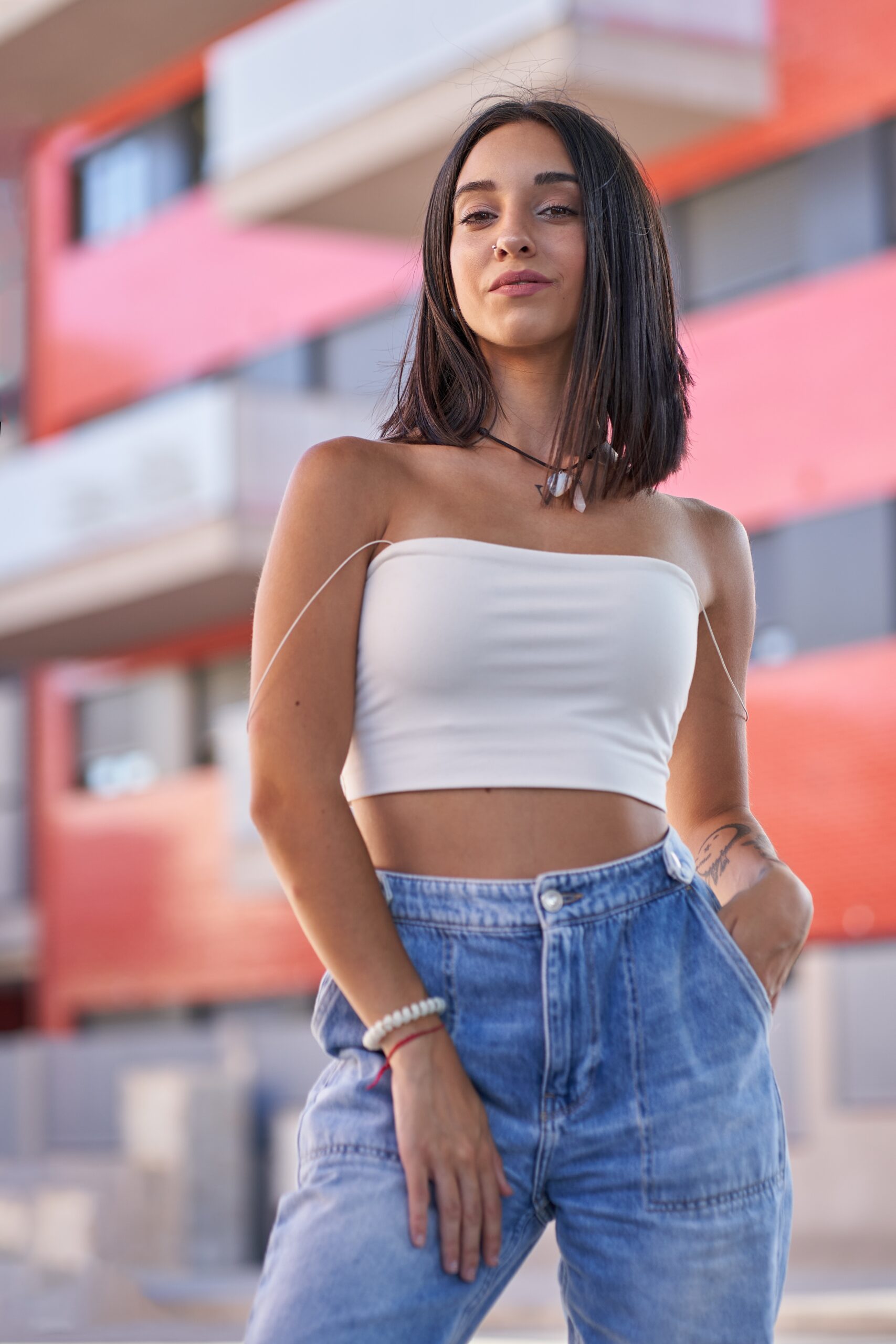 Beautiful Latina Model In Jeans Posing For Camera
